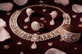 Premium rose gold diamond jewelry set with flowers and hearts